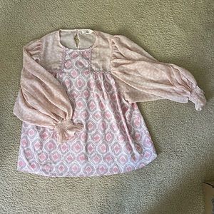 Gently-used, seasonal transitional top with flowy sleeves.